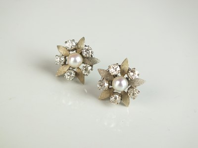 Lot 250 - A pair of diamond and pearl floral cluster earrings