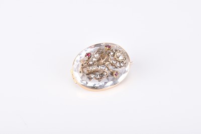 Lot 292 - A late 19th century rock crystal, diamond and ruby set brooch