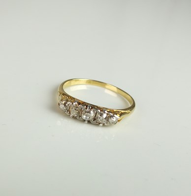 Lot 267 - A graduated old cut five stone diamond ring