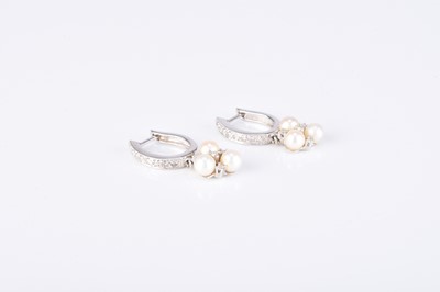 Lot 289 - A pair of pearl and diamond earrings