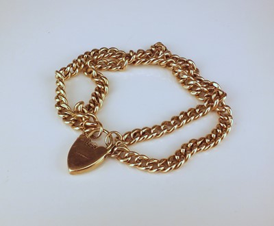 Lot 262 - A 9ct gold double curb link bracelet