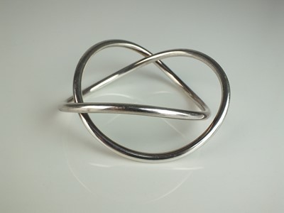 Lot 307 - A George Jensen silver ‘Swing’ bracelet/bangle