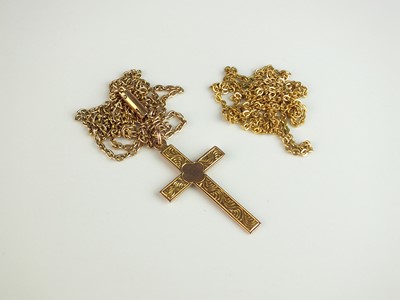 Lot 315 - A yellow metal crucifix pendant on chain