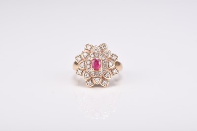 Lot 233 - A 9ct gold ruby and diamond cluster ring