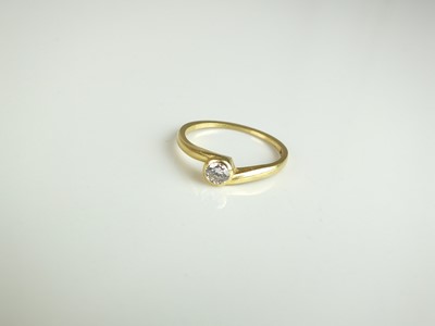 Lot 222 - An 18ct gold single stone diamond ring