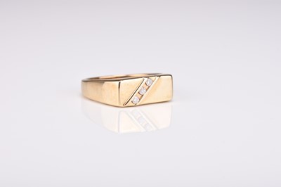 Lot 251 - A 9ct gold diamond set signet ring