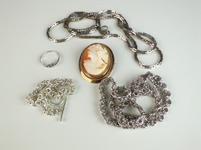 Lot 269 - A cameo brooch, a silver necklace, a silver bracelet, a plated chain and a ring
