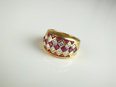 Lot 312 - An 18ct gold ruby and diamond ring