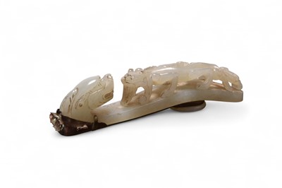 Lot 62 - A Chinese nephrite jade and bronze-mounted hand mirror, Qing Dynasty