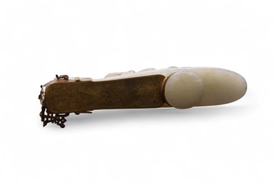 Lot 62 - A Chinese nephrite jade and bronze-mounted hand mirror, Qing Dynasty