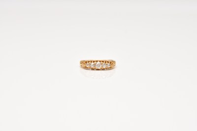 Lot 315 - An 18ct gold five stone graduated old cut diamond ring