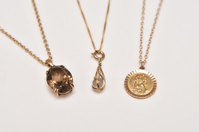Lot 187 - Three pendants on chains