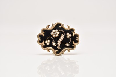 Lot 135 - A Victorian seed pearl, diamond and black enamel mourning brooch