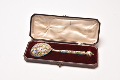 Lot 99 - A late 19th century Russian silver gilt and champleve enamel spoon
