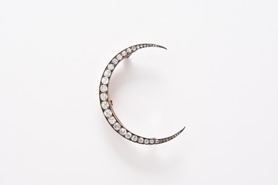Lot 133 - A late 19th century diamond set crescent brooch