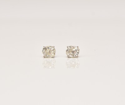 Lot 199 - A pair of 18ct white gold old cut diamond stud earrings