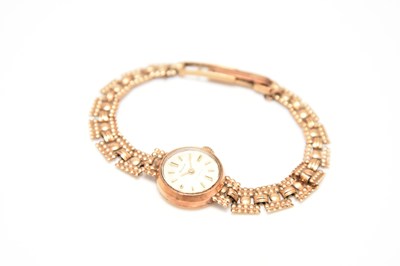 Lot 358 - Accurist: A lady's 9ct gold bracelet watch