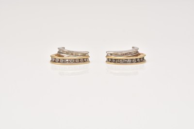 Lot 258 - A pair of square and brilliant cut diamond earrings