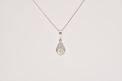 Lot 112 - A diamond pendant on chain