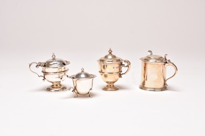 Lot 30 - A collection of four silver mustard pots