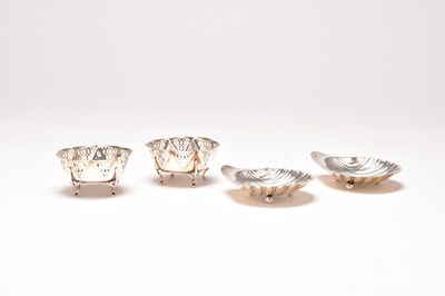 Lot 73 - A pair of shell form silver butter dishes and a pair of silver dishes