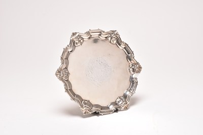 Lot 108 - A white metal salver