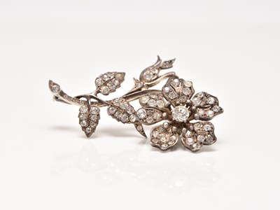 Lot 161 - A late 19th century French silver and paste en-tremblant flower brooch