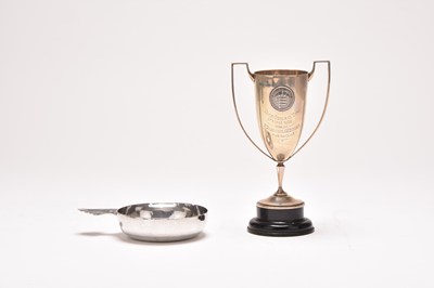 Lot 51 - A silver wine taster and a silver trophy cup