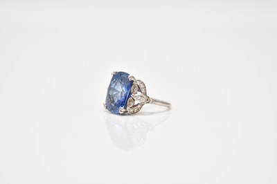 Lot 238 - A mid-20th century sapphire and diamond ring
