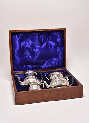 Lot 19 - An Edwardian cased four piece silver tea and coffee service