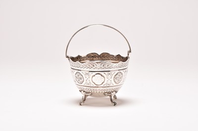 Lot 28 - A silver sugar basket