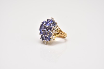 Lot 200 - A tanzanite and diamond cluster ring