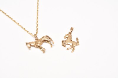 Lot 150 - Two 9ct gold horse pendants and a 9ct gold chain