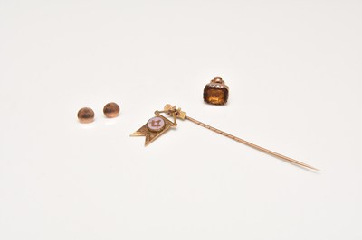 Lot 194 - A stick pin, two studs and a fob