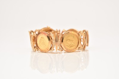 Lot 116 - A coin set bracelet