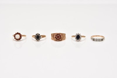 Lot 127 - Four stone set rings