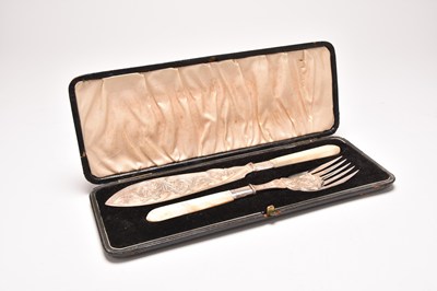 Lot 14 - A cased pair of Victorian silver fish servers