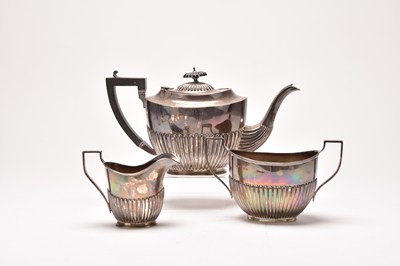 Lot 83 - A three piece silver tea service