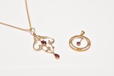 Lot 193 - Two early 20th century pendants