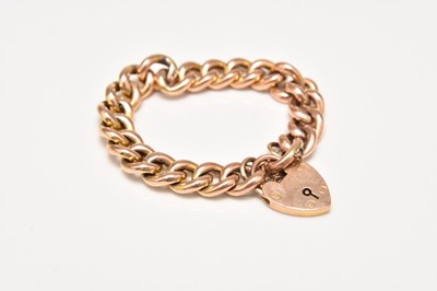 Lot 228 - A yellow metal curb link bracelet