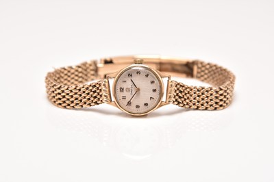 Lot 340 - Omega: A lady's 9ct gold bracelet watch
