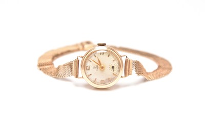 Lot 353 - Tudor: A lady's 9ct gold bracelet watch