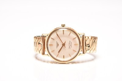 Lot 351 - Longines: A gentleman's 9ct gold Flagship wristwatch