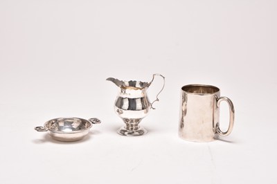 Lot 9 - A silver cream jug, wine taster and mug